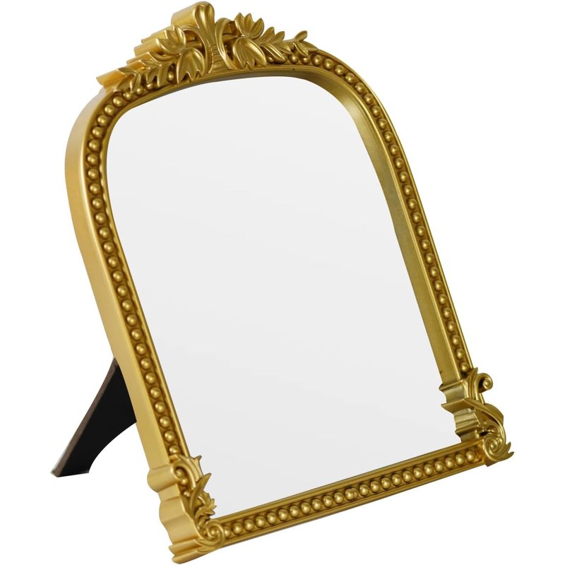 Small arched tabletop mirror
