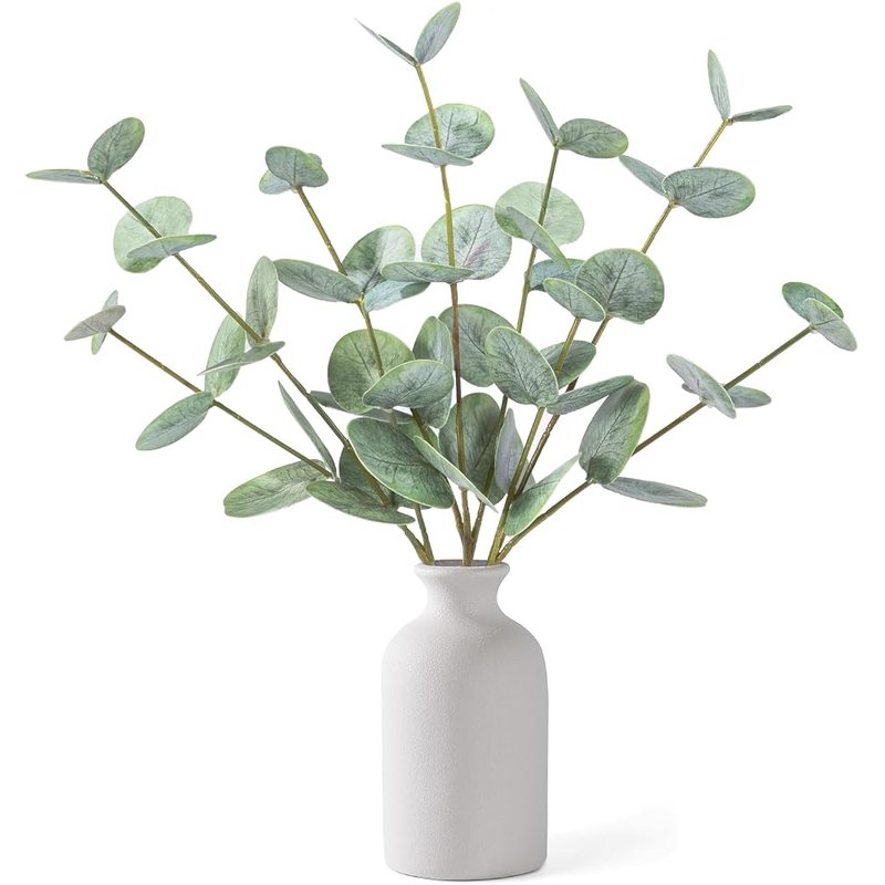 Faux eucalyptus in ceramic vase